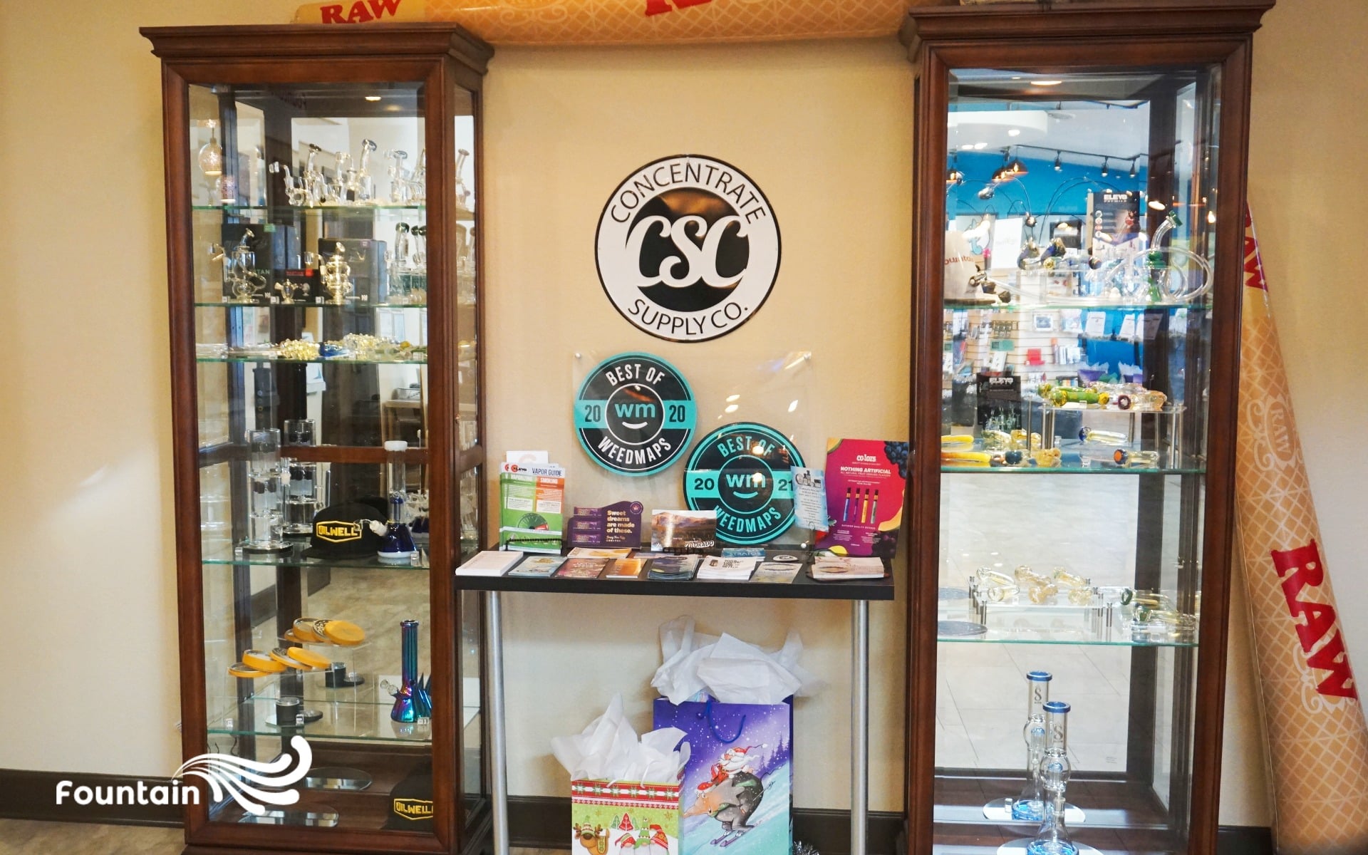 Cannabis dispensary display cases and products at Fountain Superstore in Colorado Springs.